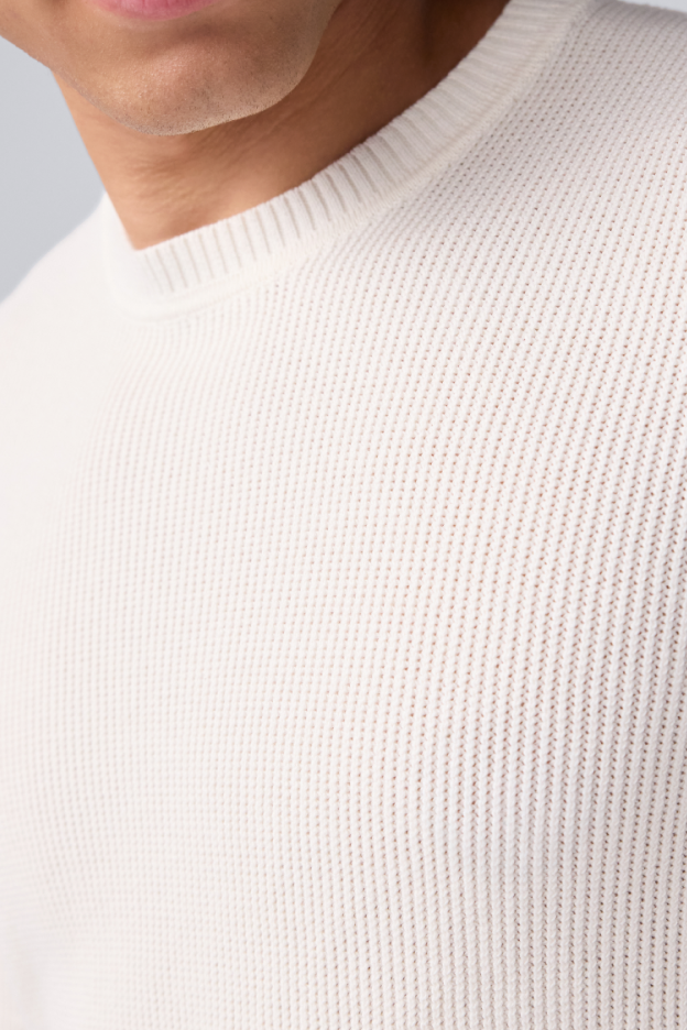 close up image of the texture of a white tech linen crew sweatshirt